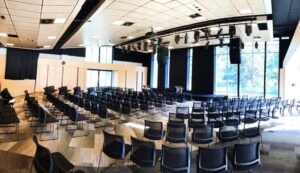 Image of Morling College Auditorium looking from the back to the front of the room.